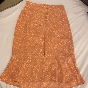 Orange and white polka dot button front midi skirt